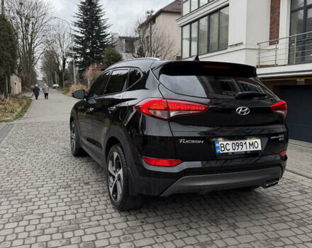 Черный Хендай Туксон, объемом двигателя 1.6 л и пробегом 123 тыс. км за 17500 $, фото 3 на Automoto.ua
