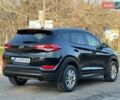 Черный Хендай Туксон, объемом двигателя 2 л и пробегом 105 тыс. км за 15500 $, фото 2 на Automoto.ua