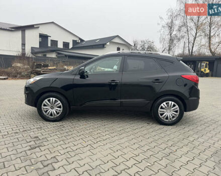 Черный Хендай Туксон, объемом двигателя 2.36 л и пробегом 205 тыс. км за 11200 $, фото 7 на Automoto.ua