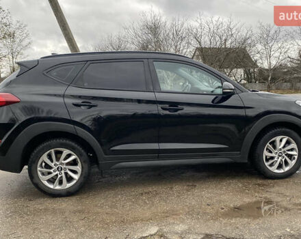 Черный Хендай Туксон, объемом двигателя 2 л и пробегом 190 тыс. км за 18000 $, фото 4 на Automoto.ua