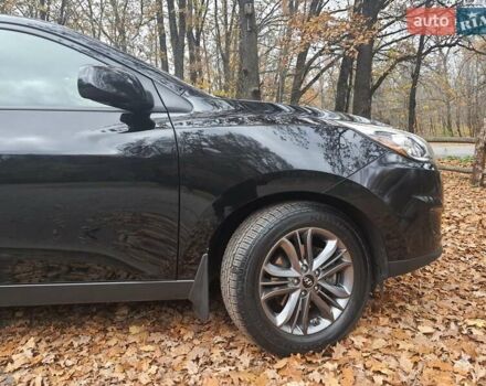 Чорний Хендай Туксон, об'ємом двигуна 2 л та пробігом 109 тис. км за 14500 $, фото 9 на Automoto.ua