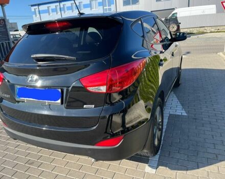 Черный Хендай Туксон, объемом двигателя 2 л и пробегом 140 тыс. км за 12900 $, фото 1 на Automoto.ua