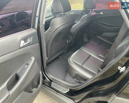 Черный Хендай Туксон, объемом двигателя 2 л и пробегом 190 тыс. км за 18000 $, фото 15 на Automoto.ua