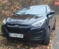 Чорний Хендай Туксон, об'ємом двигуна 2 л та пробігом 109 тис. км за 14500 $, фото 1 на Automoto.ua