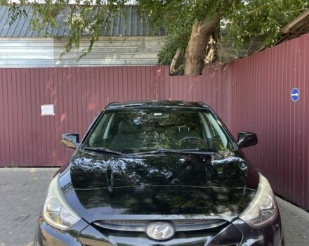 Чорний Хендай Туксон, об'ємом двигуна 2 л та пробігом 140 тис. км за 12300 $, фото 1 на Automoto.ua