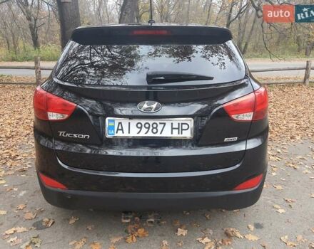 Чорний Хендай Туксон, об'ємом двигуна 2 л та пробігом 109 тис. км за 14500 $, фото 7 на Automoto.ua