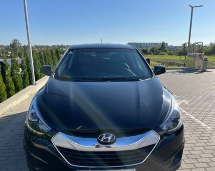 Черный Хендай Туксон, объемом двигателя 2 л и пробегом 140 тыс. км за 12900 $, фото 5 на Automoto.ua