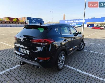 Черный Хендай Туксон, объемом двигателя 2 л и пробегом 215 тыс. км за 18900 $, фото 13 на Automoto.ua