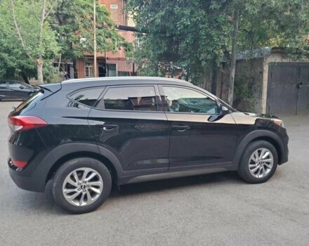 Чорний Хендай Туксон, об'ємом двигуна 2 л та пробігом 104 тис. км за 10100 $, фото 12 на Automoto.ua