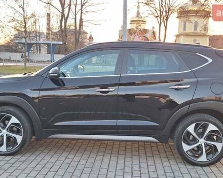Чорний Хендай Туксон, об'ємом двигуна 2 л та пробігом 192 тис. км за 21000 $, фото 20 на Automoto.ua