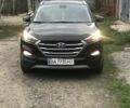 Черный Хендай Туксон, объемом двигателя 1.59 л и пробегом 188 тыс. км за 15500 $, фото 1 на Automoto.ua