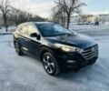 Черный Хендай Туксон, объемом двигателя 1.6 л и пробегом 74 тыс. км за 5000 $, фото 1 на Automoto.ua