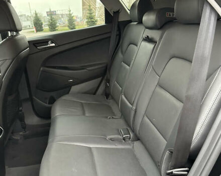 Черный Хендай Туксон, объемом двигателя 2 л и пробегом 120 тыс. км за 17800 $, фото 11 на Automoto.ua