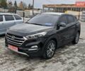 Черный Хендай Туксон, объемом двигателя 2 л и пробегом 178 тыс. км за 19200 $, фото 1 на Automoto.ua