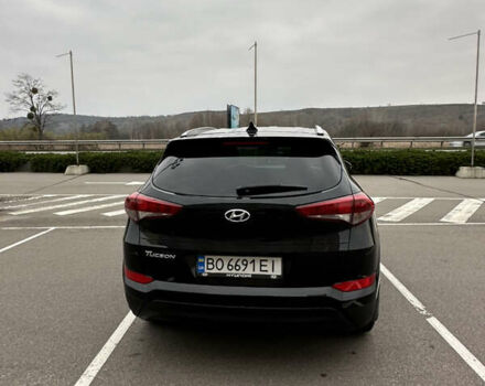 Черный Хендай Туксон, объемом двигателя 2 л и пробегом 120 тыс. км за 17800 $, фото 5 на Automoto.ua