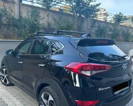 Черный Хендай Туксон, объемом двигателя 2 л и пробегом 71 тыс. км за 19999 $, фото 1 на Automoto.ua