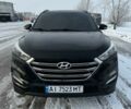 Черный Хендай Туксон, объемом двигателя 2 л и пробегом 103 тыс. км за 18500 $, фото 1 на Automoto.ua