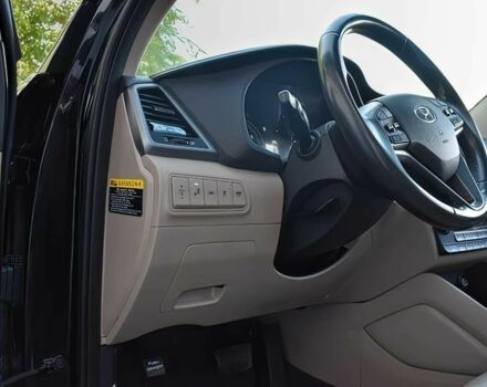 Черный Хендай Туксон, объемом двигателя 1.6 л и пробегом 73 тыс. км за 16200 $, фото 10 на Automoto.ua