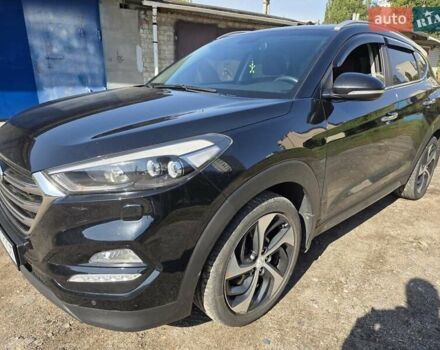 Черный Хендай Туксон, объемом двигателя 1.98 л и пробегом 112 тыс. км за 18300 $, фото 1 на Automoto.ua