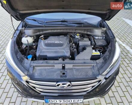 Черный Хендай Туксон, объемом двигателя 2 л и пробегом 215 тыс. км за 18900 $, фото 10 на Automoto.ua