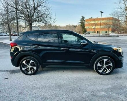 Черный Хендай Туксон, объемом двигателя 1.6 л и пробегом 71 тыс. км за 9000 $, фото 6 на Automoto.ua