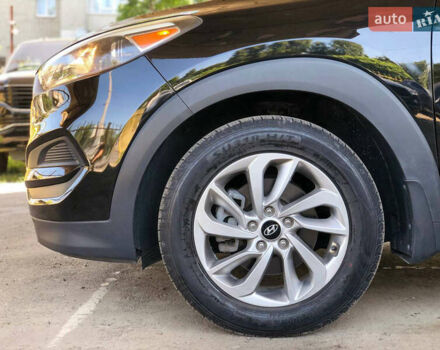 Чорний Хендай Туксон, об'ємом двигуна 2 л та пробігом 134 тис. км за 15700 $, фото 6 на Automoto.ua