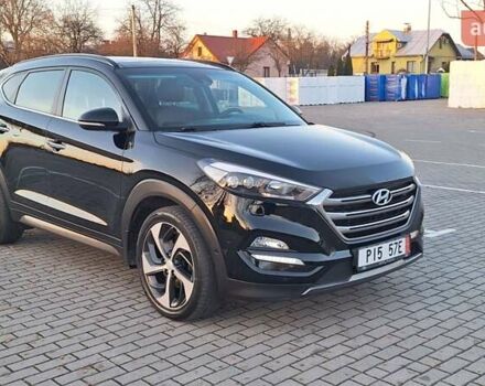 Чорний Хендай Туксон, об'ємом двигуна 2 л та пробігом 192 тис. км за 21000 $, фото 5 на Automoto.ua