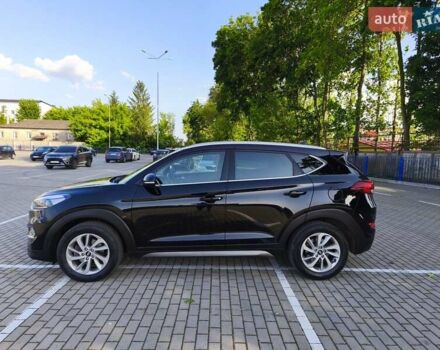 Черный Хендай Туксон, объемом двигателя 2 л и пробегом 215 тыс. км за 18900 $, фото 4 на Automoto.ua