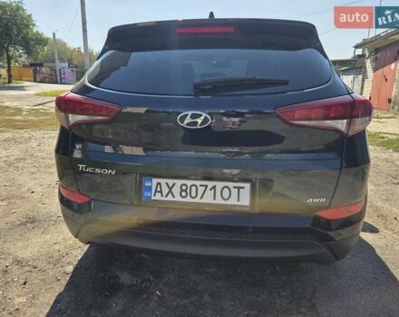 Черный Хендай Туксон, объемом двигателя 1.98 л и пробегом 112 тыс. км за 18300 $, фото 5 на Automoto.ua