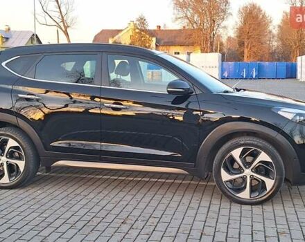 Чорний Хендай Туксон, об'ємом двигуна 2 л та пробігом 192 тис. км за 21000 $, фото 7 на Automoto.ua