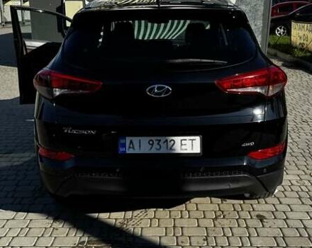Черный Хендай Туксон, объемом двигателя 2 л и пробегом 222 тыс. км за 14000 $, фото 6 на Automoto.ua