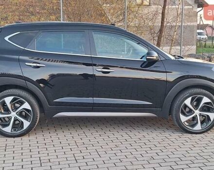 Черный Хендай Туксон, объемом двигателя 2 л и пробегом 192 тыс. км за 19999 $, фото 6 на Automoto.ua