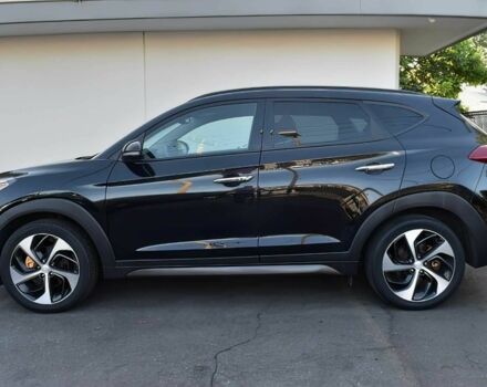 Черный Хендай Туксон, объемом двигателя 1.6 л и пробегом 73 тыс. км за 16200 $, фото 3 на Automoto.ua