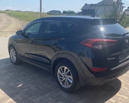 Черный Хендай Туксон, объемом двигателя 2 л и пробегом 126 тыс. км за 14500 $, фото 4 на Automoto.ua