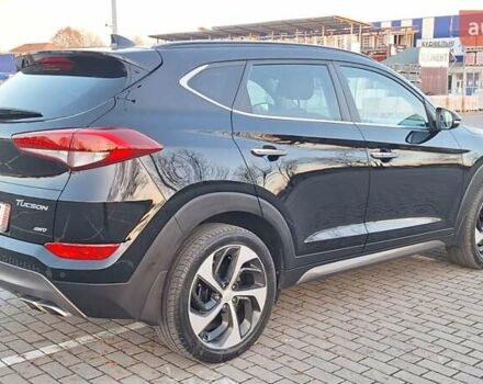 Чорний Хендай Туксон, об'ємом двигуна 2 л та пробігом 192 тис. км за 21000 $, фото 9 на Automoto.ua