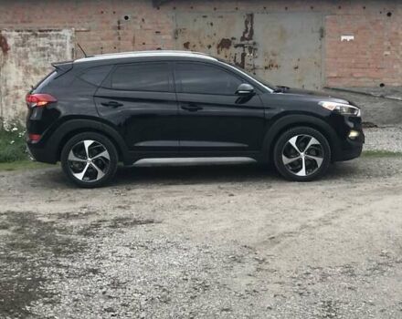 Черный Хендай Туксон, объемом двигателя 1.59 л и пробегом 188 тыс. км за 15500 $, фото 3 на Automoto.ua