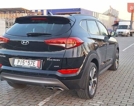 Чорний Хендай Туксон, об'ємом двигуна 2 л та пробігом 192 тис. км за 21000 $, фото 10 на Automoto.ua