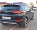 Чорний Хендай Туксон, об'ємом двигуна 2 л та пробігом 192 тис. км за 21000 $, фото 10 на Automoto.ua