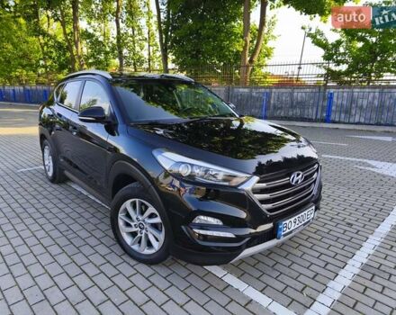Черный Хендай Туксон, объемом двигателя 2 л и пробегом 215 тыс. км за 18900 $, фото 1 на Automoto.ua