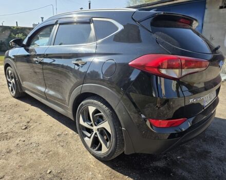 Чорний Хендай Туксон, об'ємом двигуна 2 л та пробігом 110 тис. км за 18700 $, фото 6 на Automoto.ua