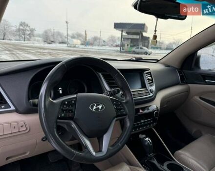 Черный Хендай Туксон, объемом двигателя 2 л и пробегом 103 тыс. км за 18500 $, фото 7 на Automoto.ua