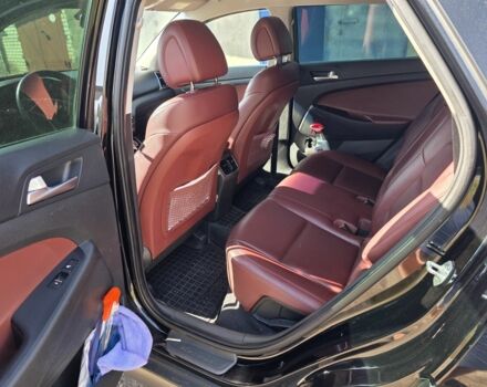 Чорний Хендай Туксон, об'ємом двигуна 2 л та пробігом 110 тис. км за 18700 $, фото 11 на Automoto.ua