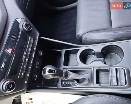 Черный Хендай Туксон, объемом двигателя 2 л и пробегом 178 тыс. км за 19200 $, фото 12 на Automoto.ua