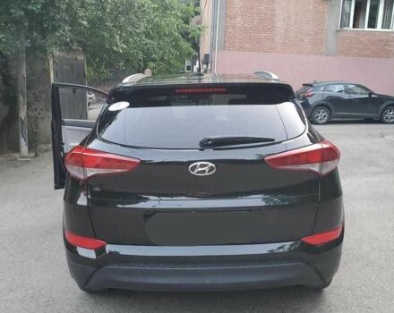 Чорний Хендай Туксон, об'ємом двигуна 2 л та пробігом 104 тис. км за 10100 $, фото 4 на Automoto.ua