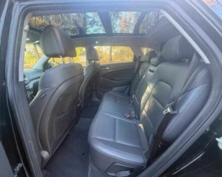 Черный Хендай Туксон, объемом двигателя 1.6 л и пробегом 99 тыс. км за 9600 $, фото 9 на Automoto.ua