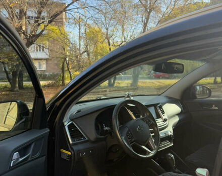 Черный Хендай Туксон, объемом двигателя 2 л и пробегом 100 тыс. км за 16300 $, фото 2 на Automoto.ua