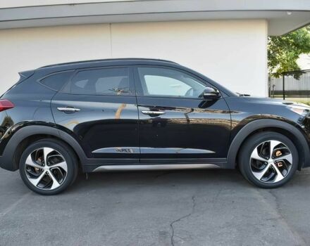 Черный Хендай Туксон, объемом двигателя 1.6 л и пробегом 73 тыс. км за 16200 $, фото 7 на Automoto.ua