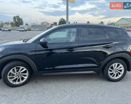Черный Хендай Туксон, объемом двигателя 2 л и пробегом 159 тыс. км за 16500 $, фото 5 на Automoto.ua