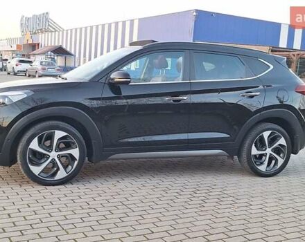 Черный Хендай Туксон, объемом двигателя 2 л и пробегом 192 тыс. км за 19999 $, фото 1 на Automoto.ua
