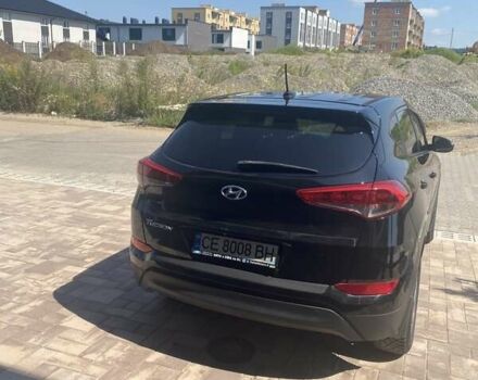 Черный Хендай Туксон, объемом двигателя 2 л и пробегом 126 тыс. км за 14500 $, фото 5 на Automoto.ua